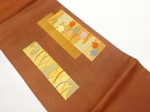 短冊に紅葉・芝・雲模様織出し名古屋帯